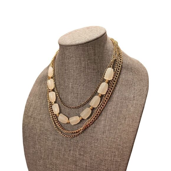 Sophia's Golden Elegance: A Four-Layered White Stone Bead Statement Necklace - Picture 8 of 10
